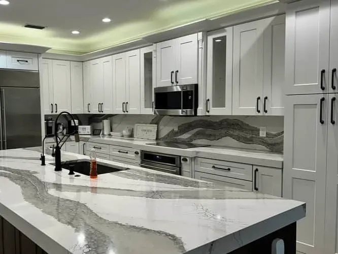White Sarasota cabinets with matte black pulls
