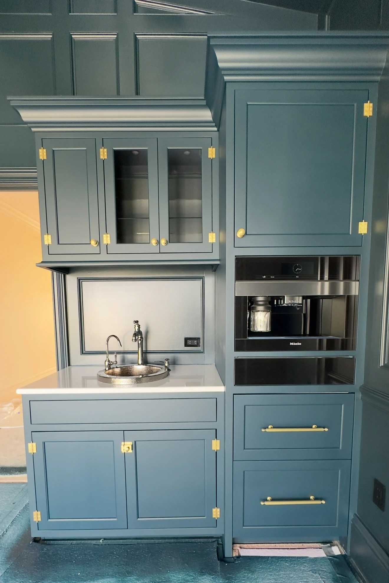 Dark green cabinet repaint delivered for a Lakewood Ranch kitchen