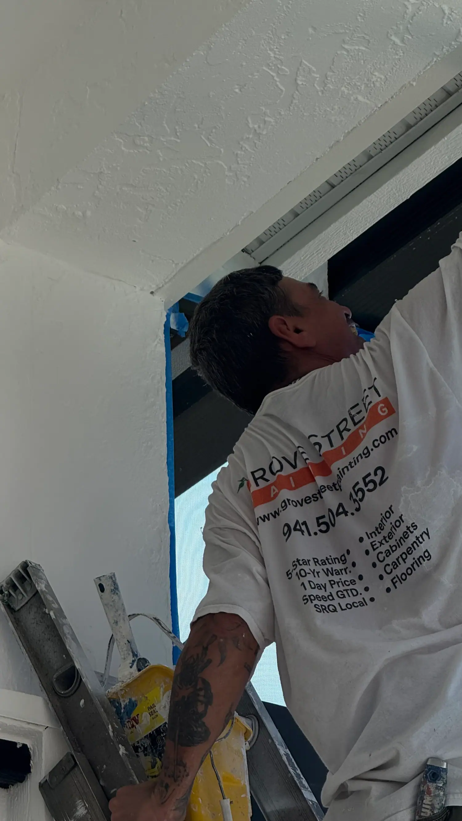 Crew brushing exterior trim