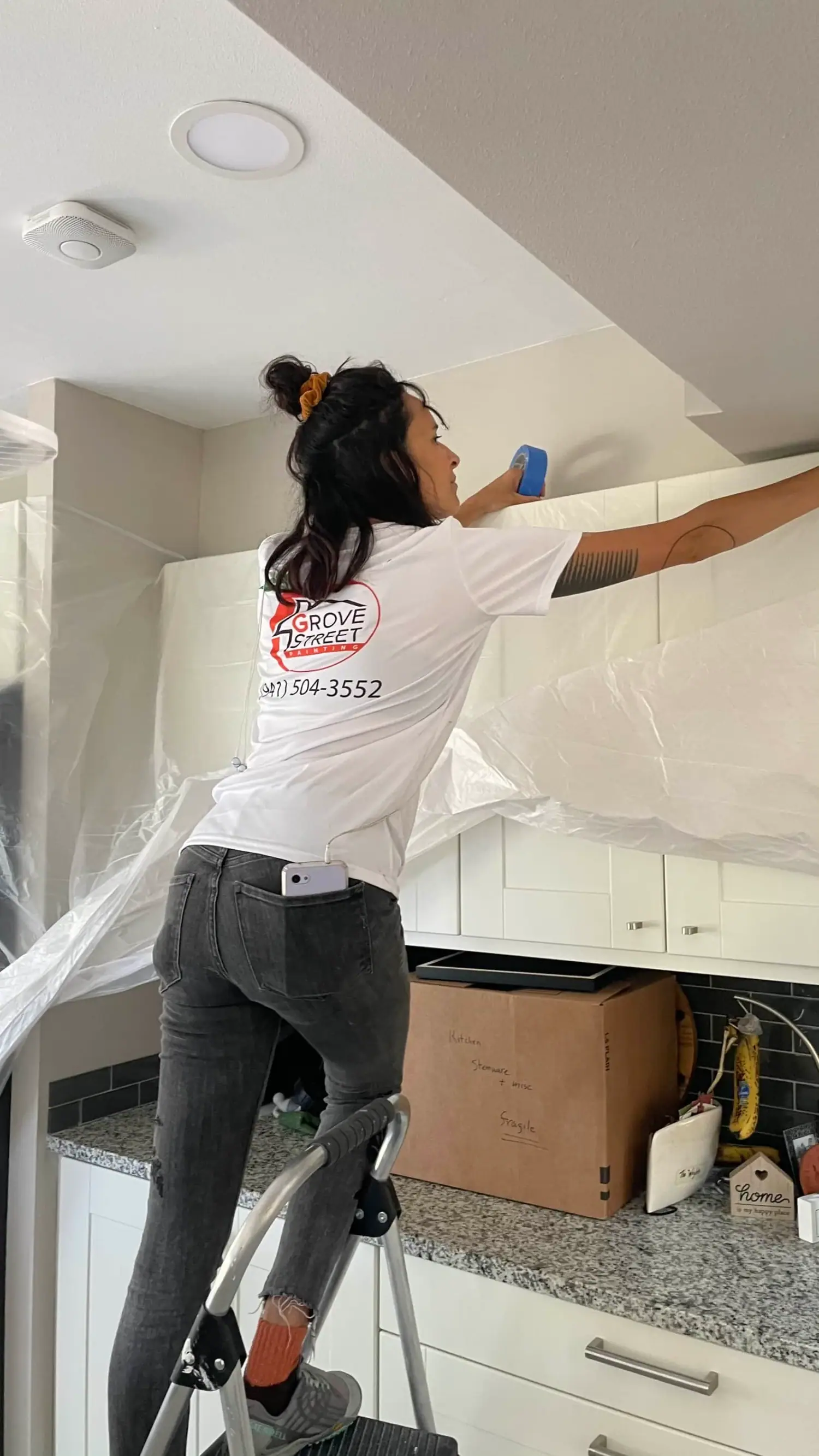 Team covering cabinets