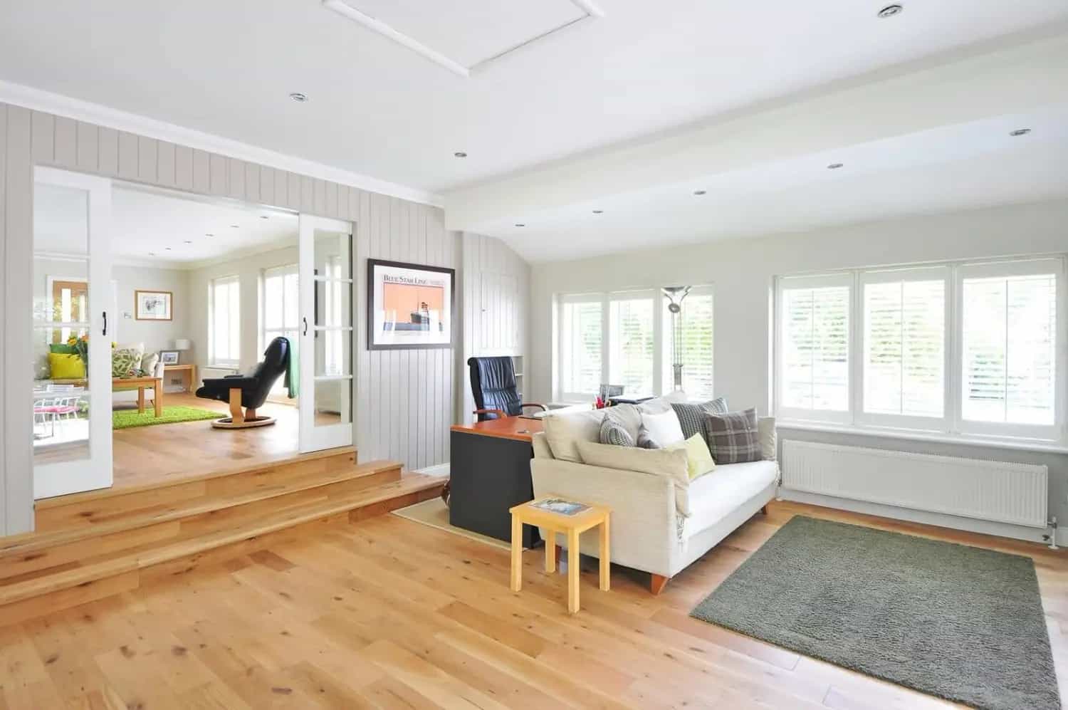 Sunlit Sarasota living room staged for premium interior painting