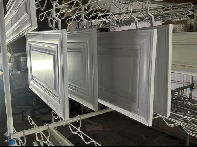 Professional spray booth setup for factory-quality cabinet finishing