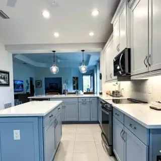 Cabinet painting Sarasota - Two-tone island and perimeter finish