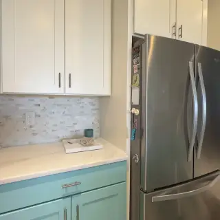 Sarasota cabinet painting - Built-in refrigerator wall refinished