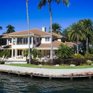 Exterior painting Sarasota - Waterfront estate finished with nightly cleanup