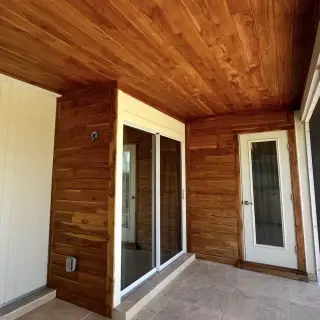 Interior painting in Sarasota - Lanai entry with refinished ceiling beams