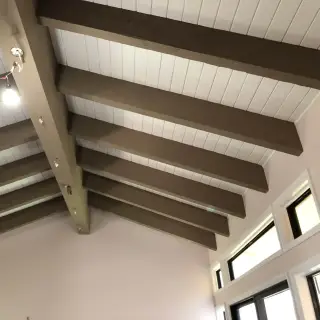 Interior painting in Sarasota - Wood beam ceiling sprayed to matte perfection